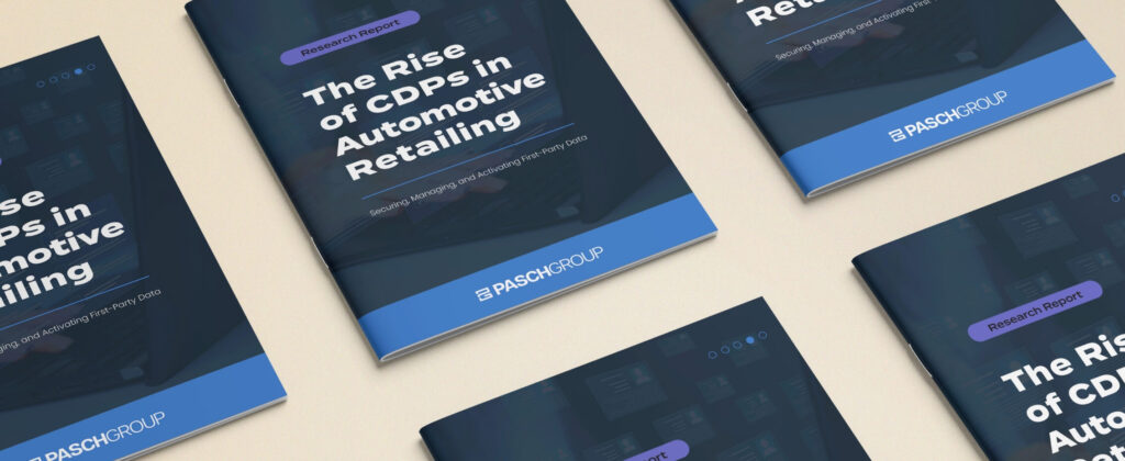 Image of a repeating set of magazine size reports with the title "The Rise of CDPs in Automotive Retailing" on a soft brown background